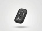 Black remote control with labeled buttons on a light gray background