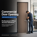 A commercial locksmith service advertisement showing a man in a dark uniform working on a wood-grain office door, with large text on the left reading 'Commercial Door Opening' and 'Fast Commercial Locksmith in Dubai'.