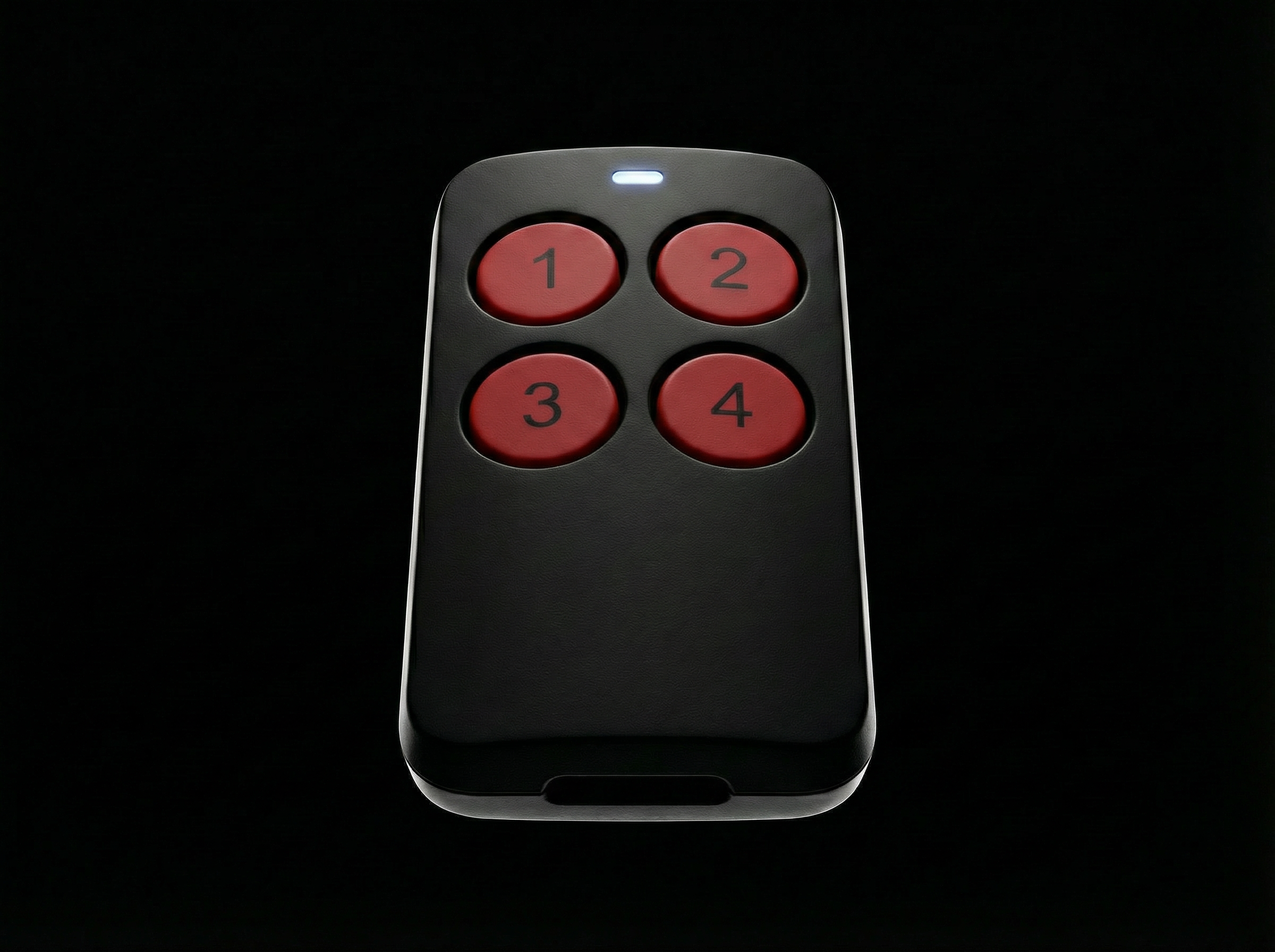 Black remote control with red buttons on a black background