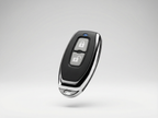 Car key fob with lock and unlock buttons on a light gray background