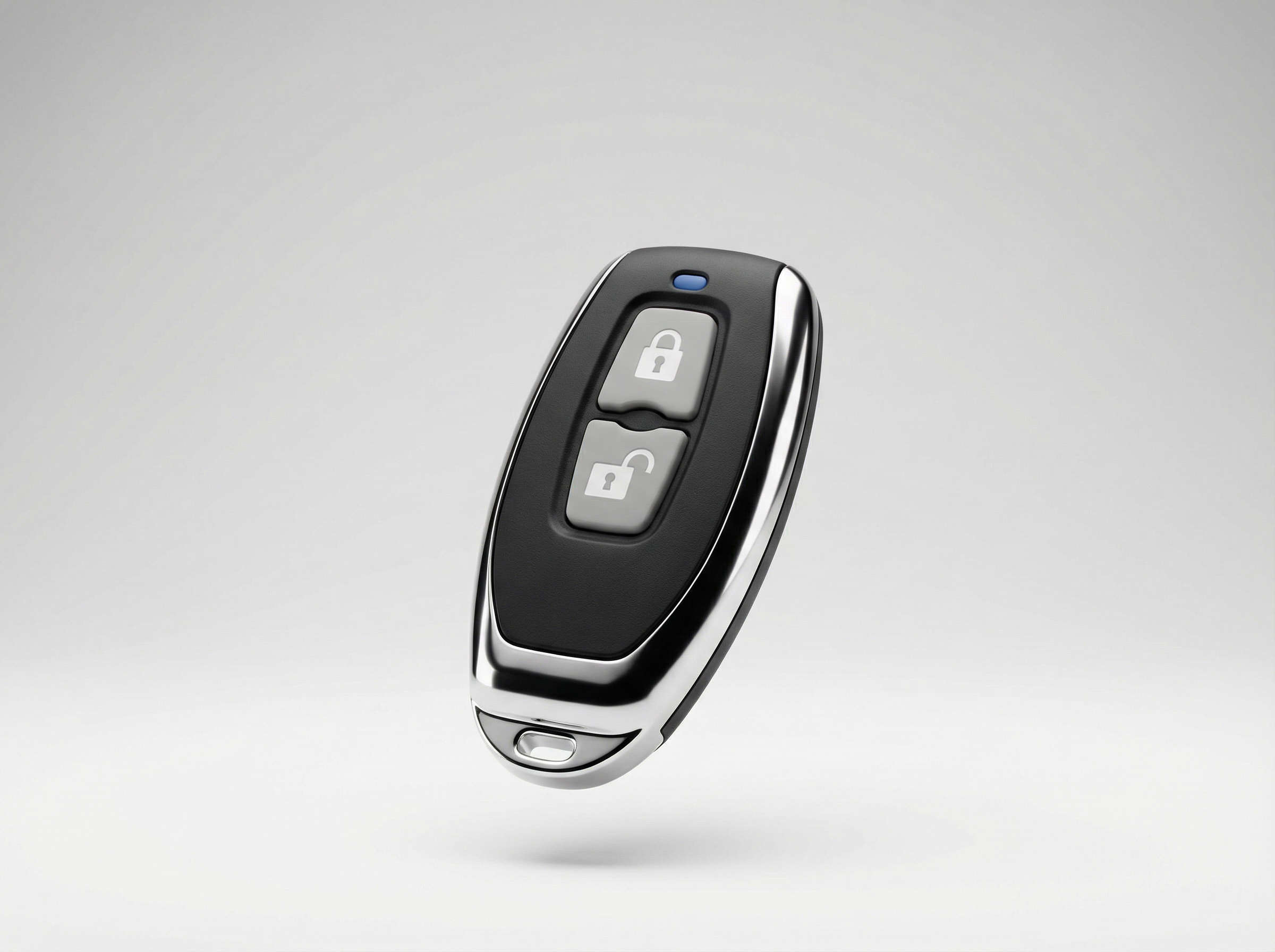 Car key fob with lock and unlock buttons on a light gray background