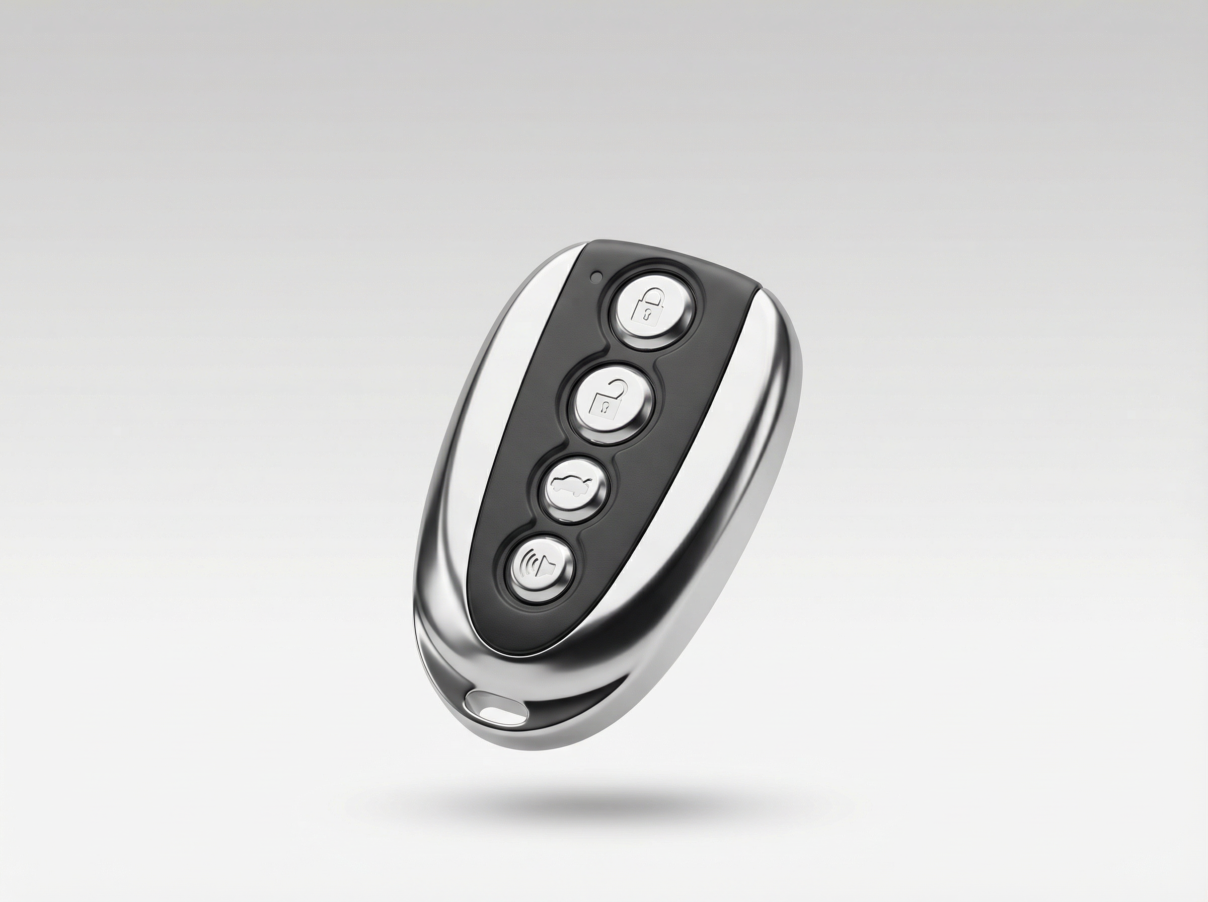 Black and silver remote control on a light gray background