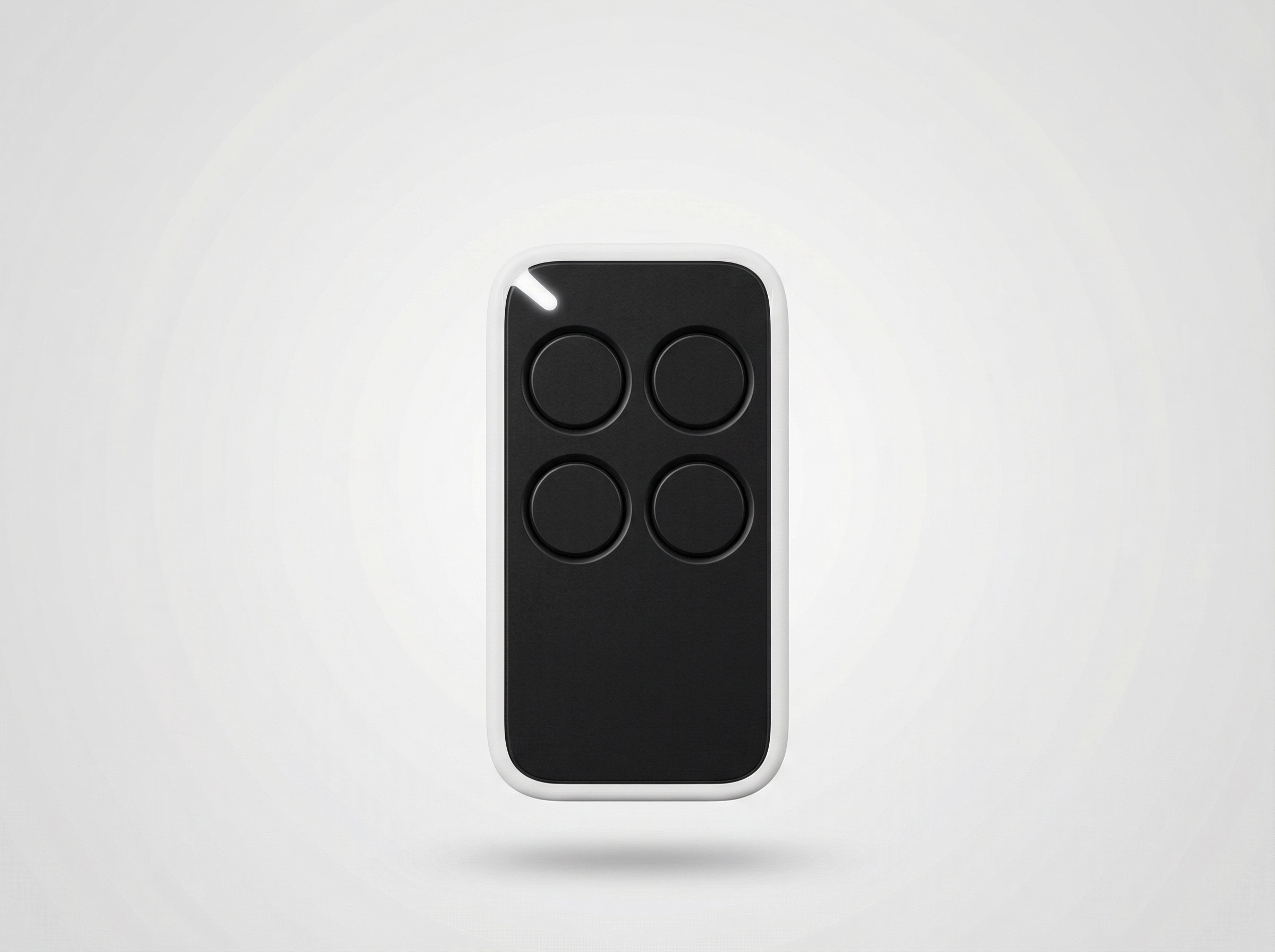 Black remote control with four buttons on a white background