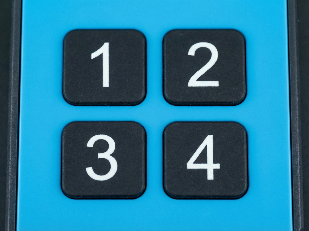 Close-up of a keypad with numbers 1, 2, 3, and 4 on a blue background