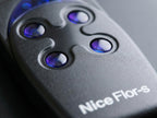 Close-up of a device labeled 'Nice Flor-S' with purple lights.