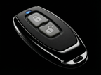 Car key fob with lock and unlock symbols on a black background