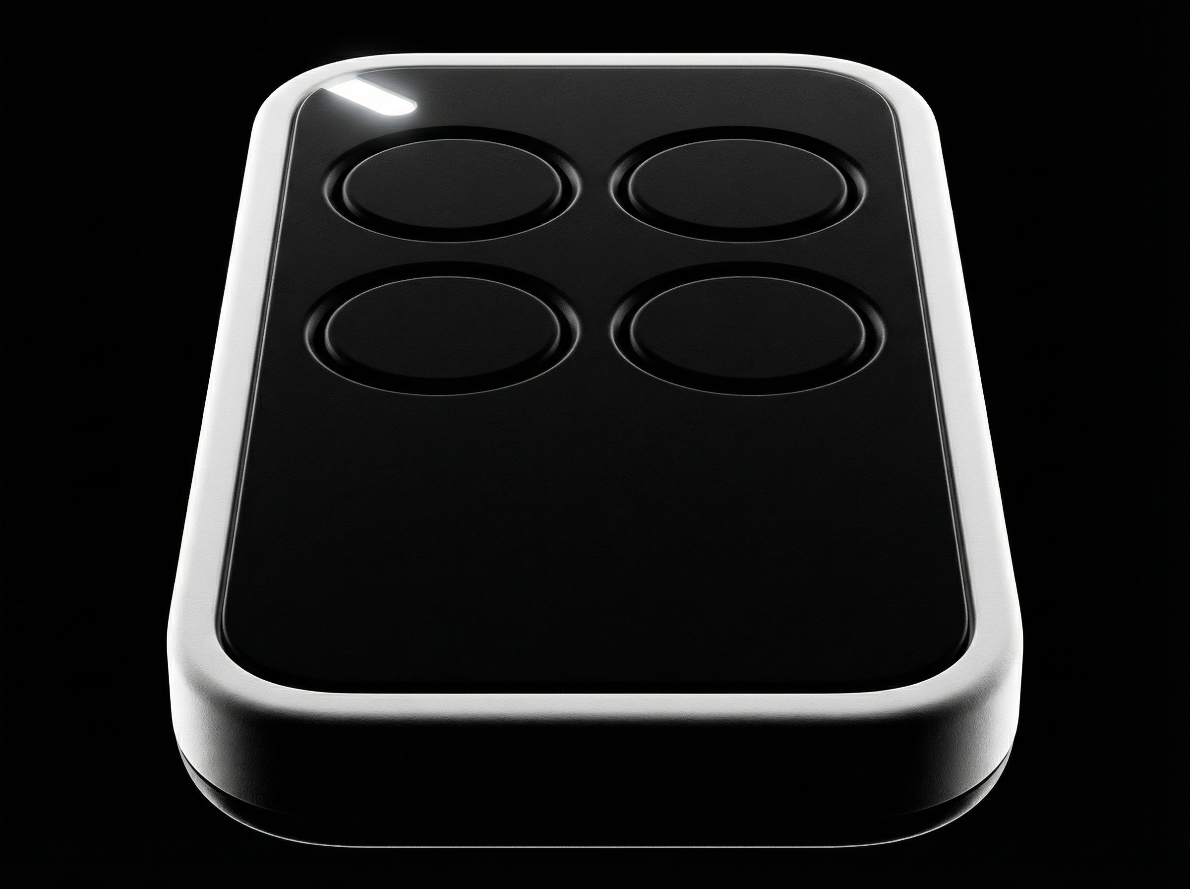 Black remote control with four buttons on a black background
